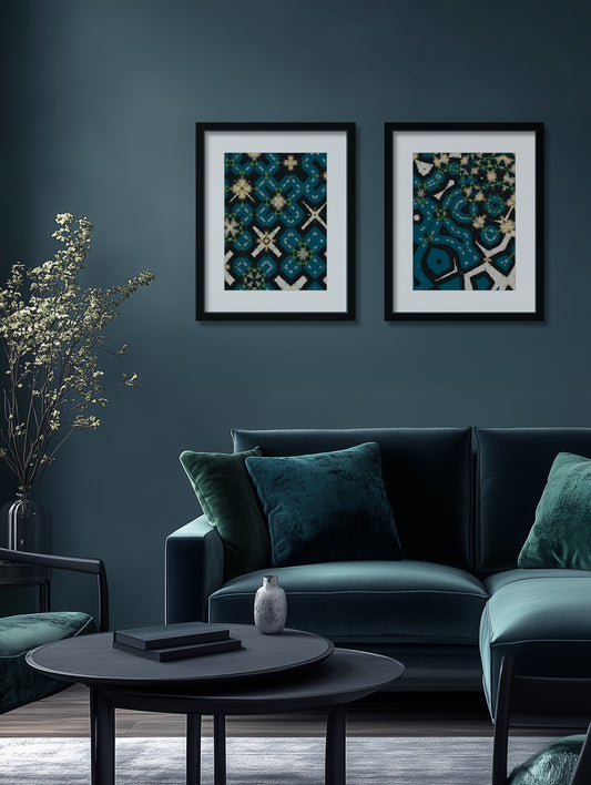 Modern living room with dark blue walls, a green sofa, and decorative artwork.